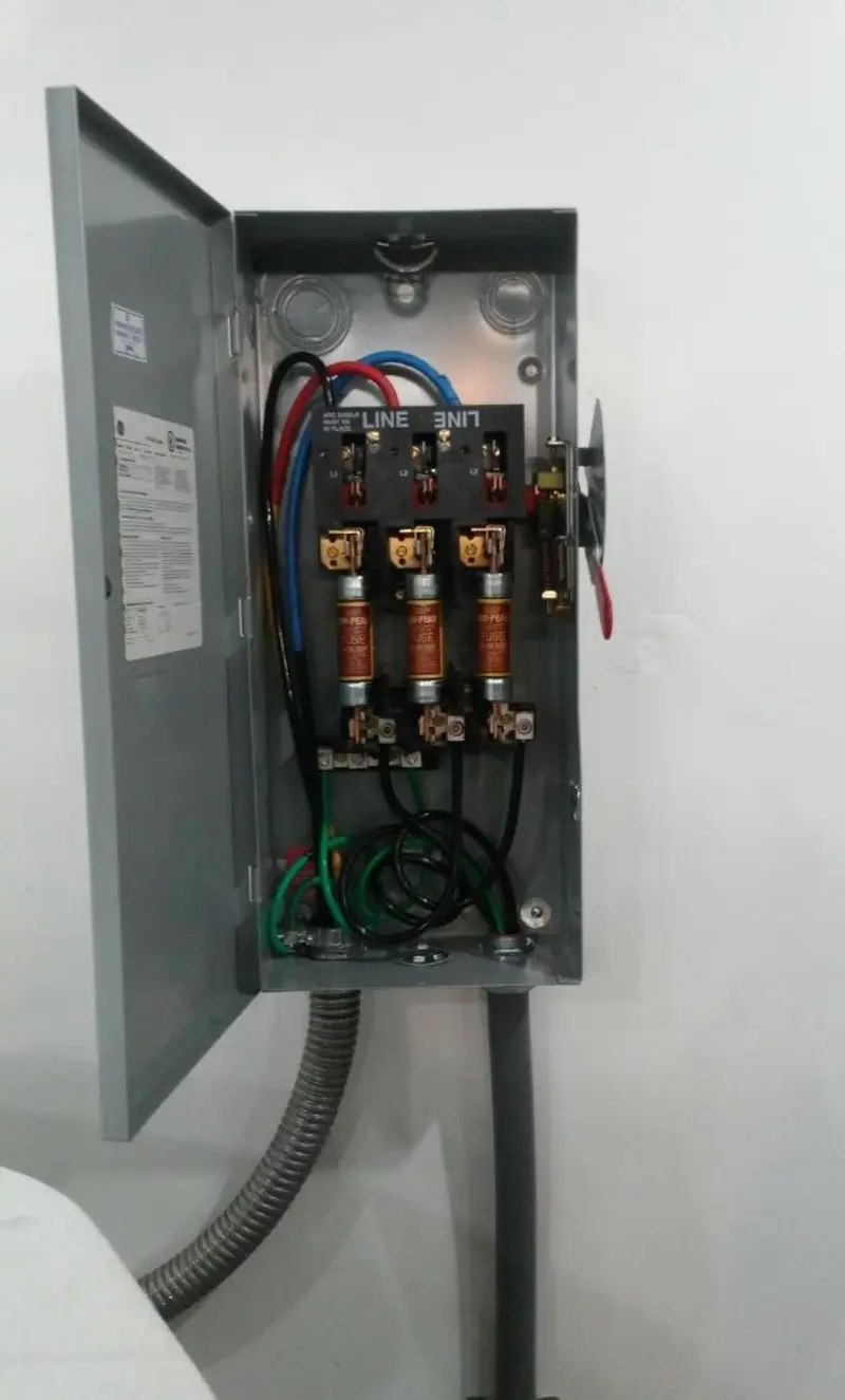 Three-phase disconnect switch installed for Smoke Detector Installation in Burlington
